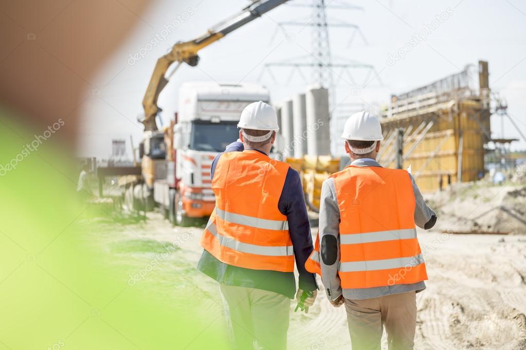 supervisors walking at construction site