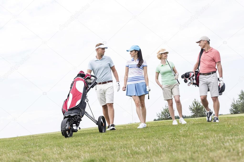 Friends talking while walking