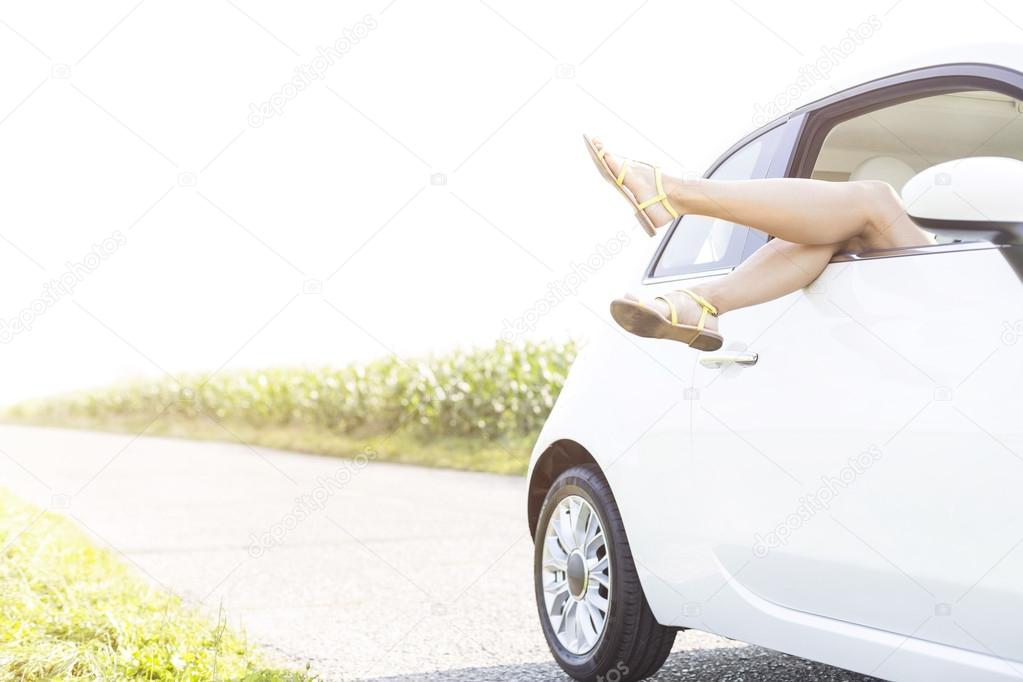 woman relaxing in car