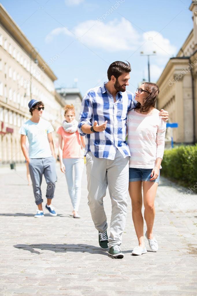 Couple walking on street