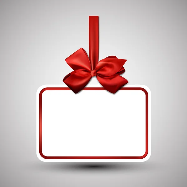 Carte cadeau en papier blanc avec noeud en satin rouge . — Image vectorielle
