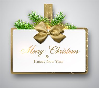 White paper gift card with spruce twigs. 