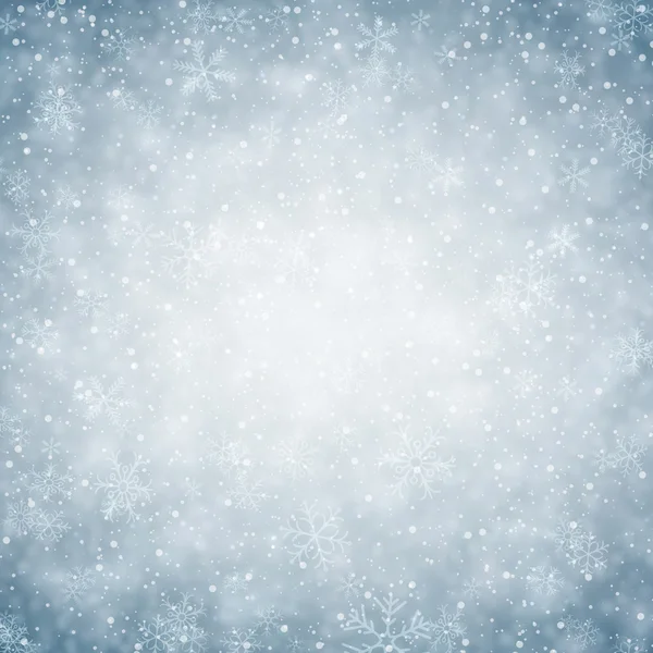 Fondo de Navidad con copos de nieve caídos . — Vector de stock