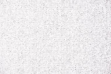 Beyaz kağıda siyah mürekkeple basılmış, ince yarım tonlu nokta desenli, düşük yoğunluklu ve ince desenli bir makro fotoğraf..