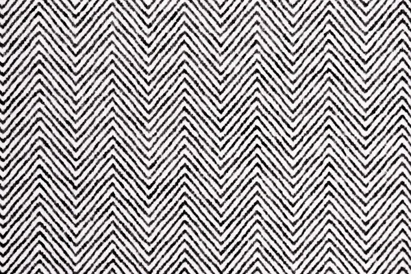 Beyaz kağıda siyah mürekkeple basılmış siyah bir sembolün aşırı yakın çekimi. İnce yarım ton dokusu ve hizalama yazıcı detaylarını ortaya çıkarıyor.