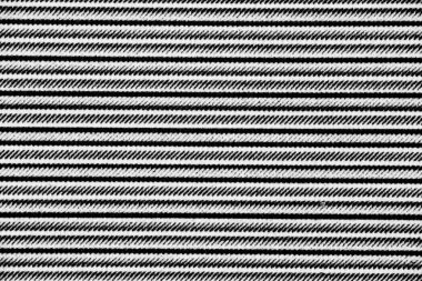 Kağıda basılmış yatay siyah ve beyaz çizgilerin yakın görüntüsü, mürekkep dokusunu ve ince yarım ton detaylarını ortaya çıkarıyor.