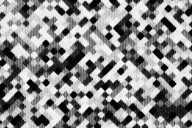 Kağıt üzerinde nokta matris dokusu ve mürekkep detaylarını gösteren, siyah ve beyaz basılı geometrik desenlerin yakın görüntüsü.