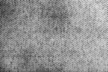 Beyaz kağıda basılmış yarım tonluk nokta deseninin aşırı yakın çekimi, sol tarafta artan nokta yoğunluğunun daha açık alanlara geçişini gösteriyor.