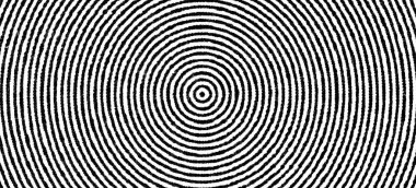 Eksantrik siyah daireleri beyaz kağıt üzerinde gösteren son derece yakın plan görüntü. Basılmış mürekkep dokusu ve tekrarlayan dairesel desen açıkça görülüyor..