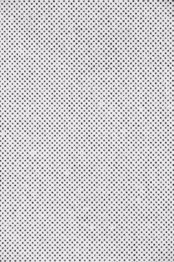 Beyaz kağıt üzerinde siyah bir yarım ton nokta deseni gösteren yakın plan görüntü, gazete ve çizgi romanlarda gradyan ve gölgeleri taklit etmek için kullanılan yaygın bir baskı tekniği.