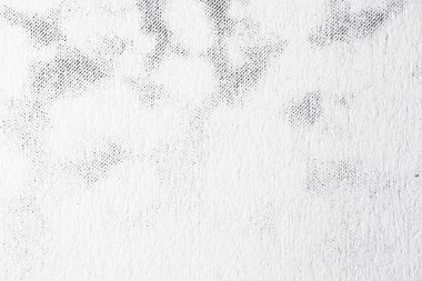 Çok hafif bir bulut benzeri yarım ton deseninin uç makrosu desenli beyaz kağıda dönüşerek etiketler, kırtasiyeler ve temiz düzenler için az bir arkaplan oluşturur..