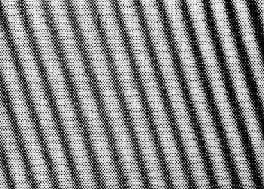 Çapraz siyah çizgiler oluşturan baskılı yarım ton noktaların makro yakın çekimi. Posterler, pankartlar, tabelalar, ambalajlar, etiketler ve web geçmişleri için yüksek kontrastlı soyut doku.