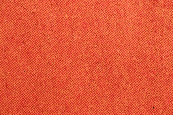 Makro yakın plan turuncu gazete mürekkebi yarım tonlu nokta desenli görünür kağıt lifleri ve ince baskılı tahıl. Medya, yazdırma, retro tasarım ve kaplamalar için büyük soyut arkaplan.