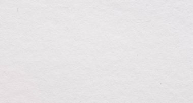 Yumuşak dokuya ve ince doğal buğdaya sahip beyaz çizim kağıdının makro yakın çekimi. Sanat, kırtasiye, baskı ve minimalist tasarım kavramları için temiz bir arkaplan ideali.