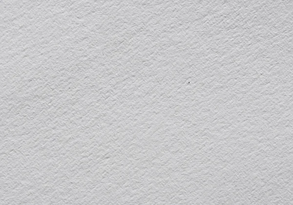 İnce tahıllı ve yumuşak desenli bir yüzeye sahip beyaz suluboya kağıdının yakın çekimi, resim, kırtasiye, maket ve yaratıcı tasarım için ideal bir sanatsal zemin..