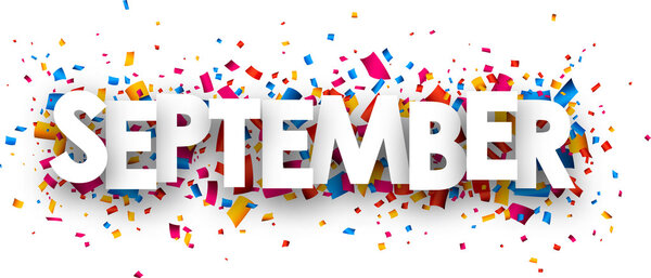 September sign with confetti