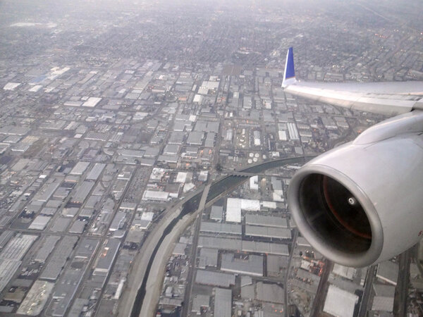 Aerial jet and wing of a commercial jet plane with the Los Angel