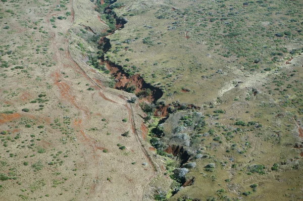 Aerial of countryside with creek running down center on Molokai — Stock Photo, Image