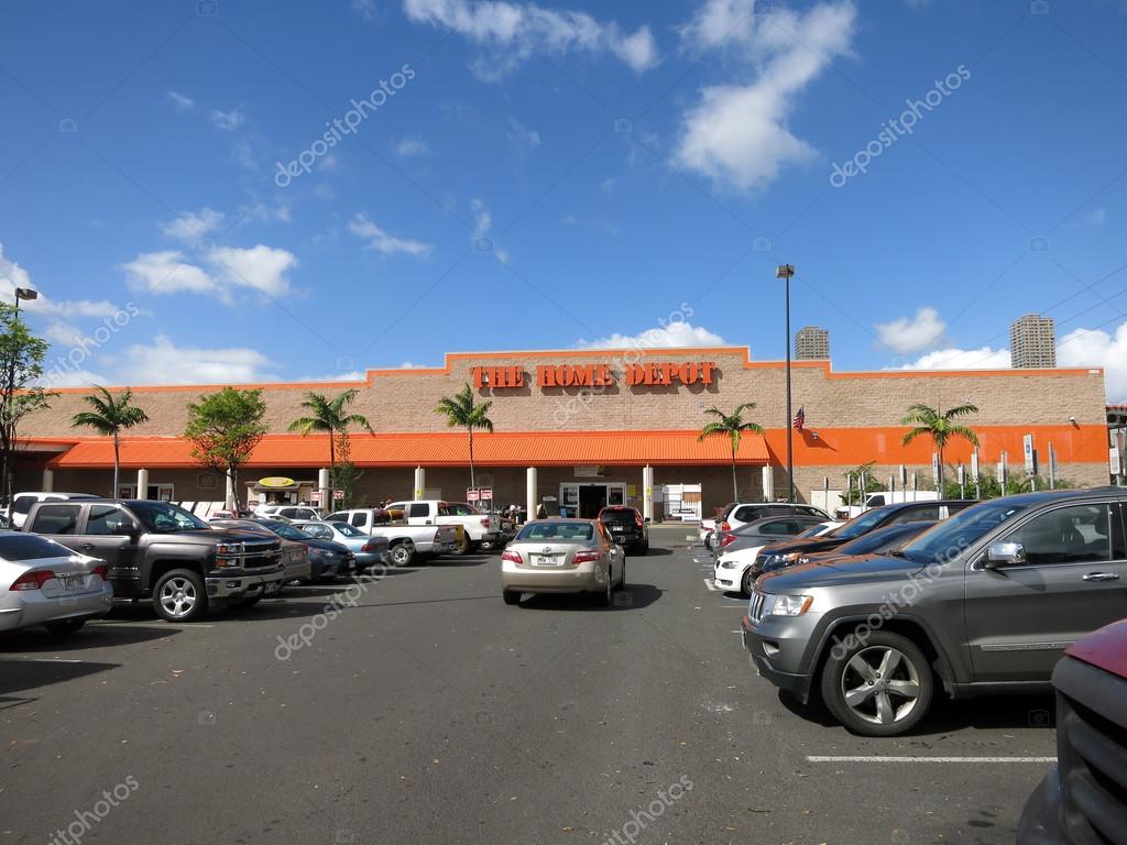 Honolulu, HI, USA - August 4, 2015: Oahu Home Depot parking lot filled with cars.  Founded in 1978, The Home Depot is a retailer of home improvement and construction products and services. It is the largest home improvement retailer in the USA.