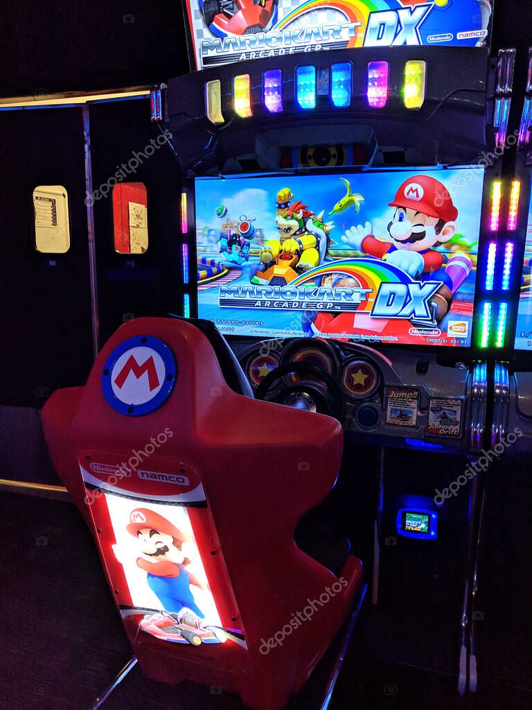 Honolulu - January 31,, 2019:  Mario Kart Arcade GP DX Cabinet unit on for play at Dave and Busters in Kakaako.