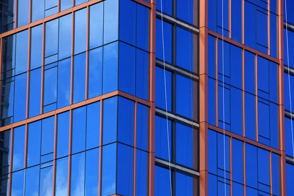 Blue Glass Windows reflect clouds — Stock Photo, Image