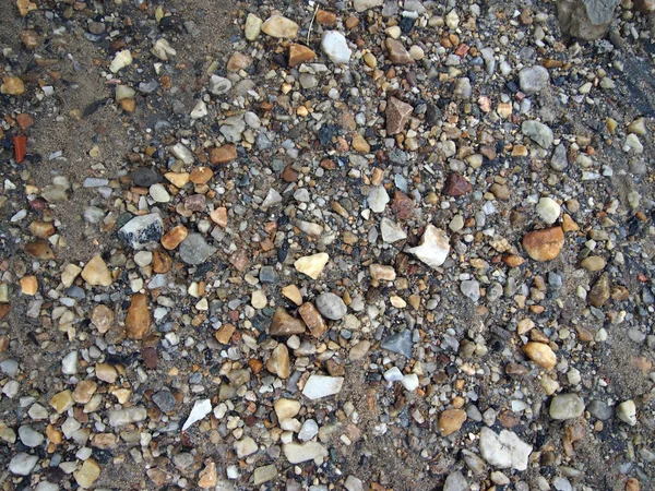 Rochas molhadas, areia e sujeira — Fotografia de Stock