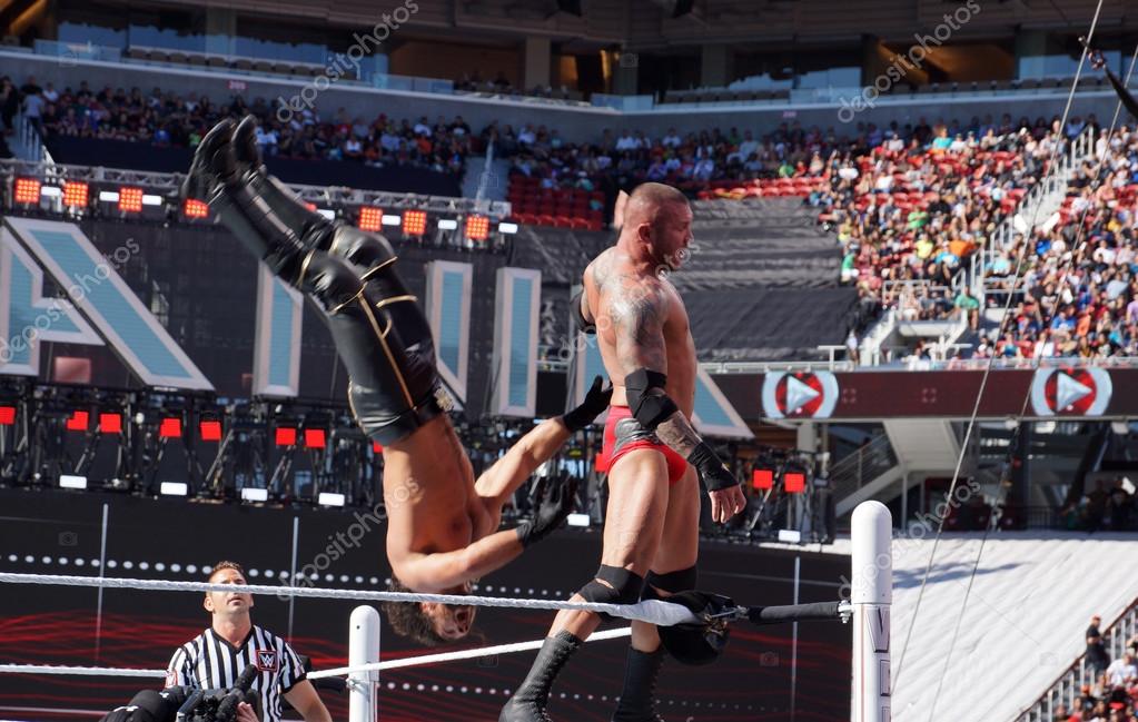 SANTA CLARA - MARCH 29: WWE Wrestler Randy Orton backflips Seth Rollins off the top turnbuckle during match at Wrestlemania 31 at the Levi's Stadium in Santa Clara, California on March 29, 2015.