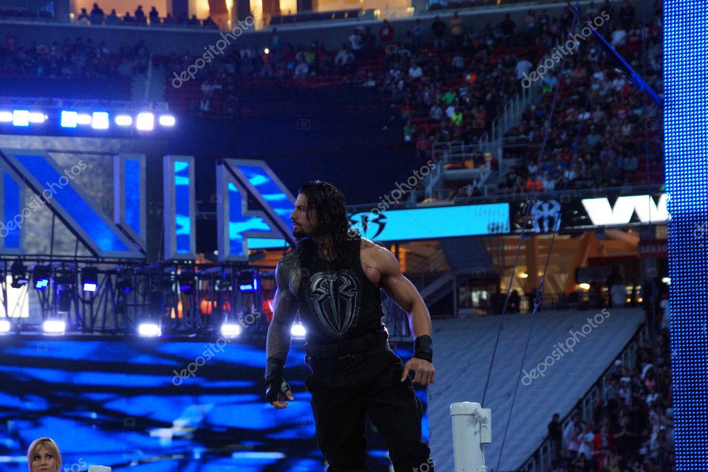 SANTA CLARA - MARCH 29: Roman Reigns wrestler stands on top turnbuckle before start of championship matchh at Wrestlemania 31 at the Levi's Stadium in Santa Clara, California on March 29, 2015.
