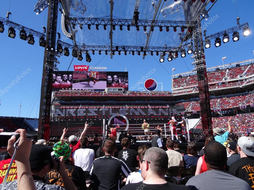 SANTA CLARA - MARCH 29: WWE Cesaro swings wrestler during tag team championship match at Wrestlemania 31 pre show at the Levi's Stadium in San Clara, California on March 29, 2015.