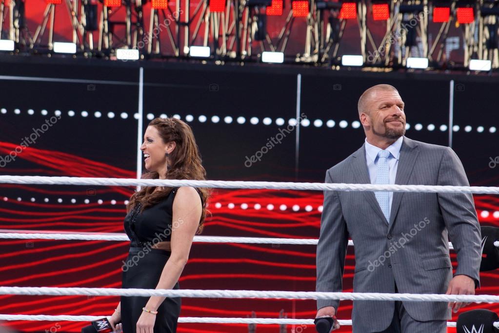 SANTA CLARA - MARCH 29: Triple H and Stephanie McMahon smile in the middle of the ring as they celebrate at Wrestlemania 31 at the Levi's Stadium in Santa Clara, California on March 29, 2015.