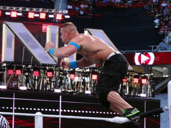 WWE Wrestler John Cena jumps off top turnbuckle — Stock Photo, Image