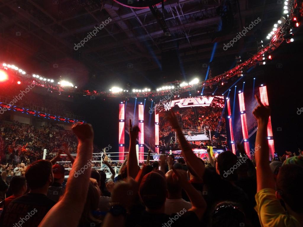 SAN JOSE - MARCH 3: Crowd points fingers in the air with the Lucha Dragons during live taping of WWE Monday Night Raw at the SAP Center in San Jose, California on March 30, 2015.