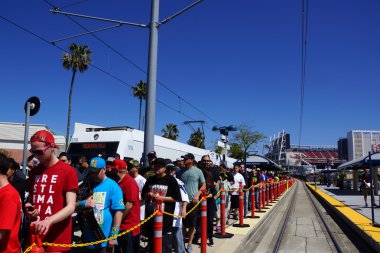 Crowd of people de-board VTA transit train to attend Wrestlemani