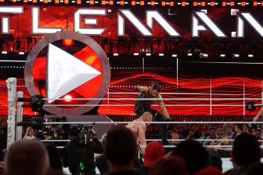 Seth Rollins curb stomps WWE Champion Brock Lesner face into the