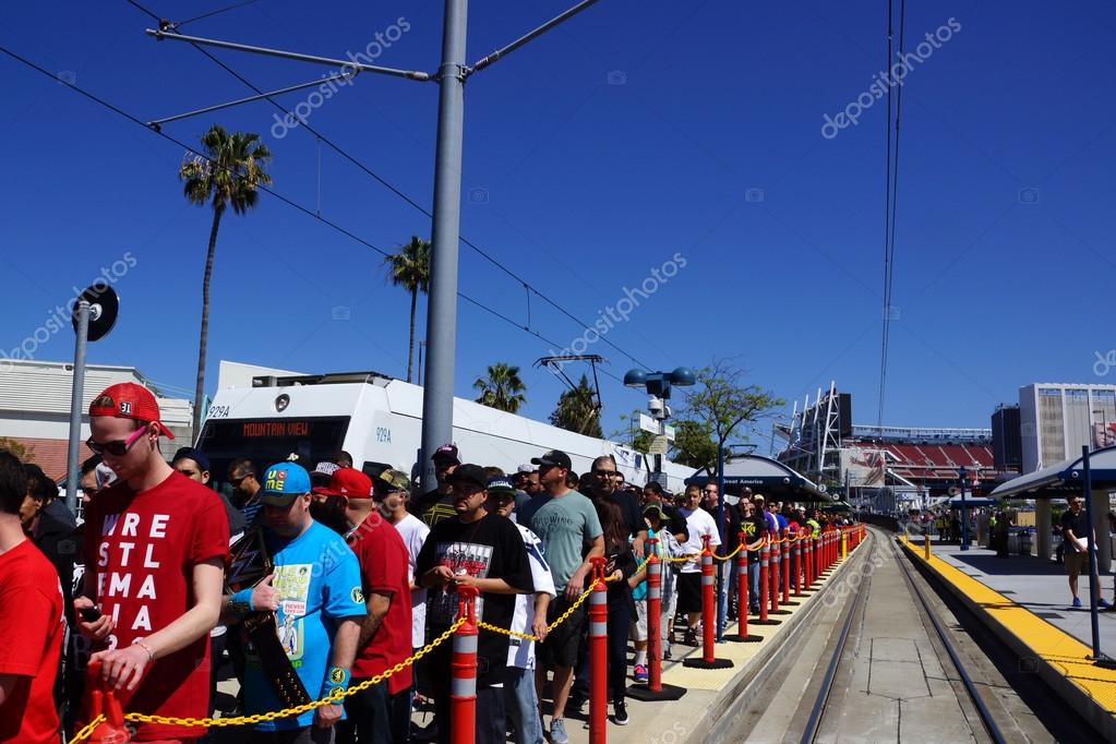 SANTA CLARA - MARCH 29:  Crowd of people de-board VTA transit train to attend Wrestlemania 31 at the Levi's Stadium in San Clara, California on March 29, 2015.