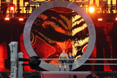 WWE Champion Brock Lesner and agent Paul Heyman enters arena