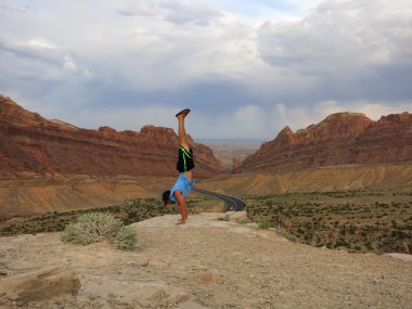 Man Handstands Spotted Wolf Canyon edge
