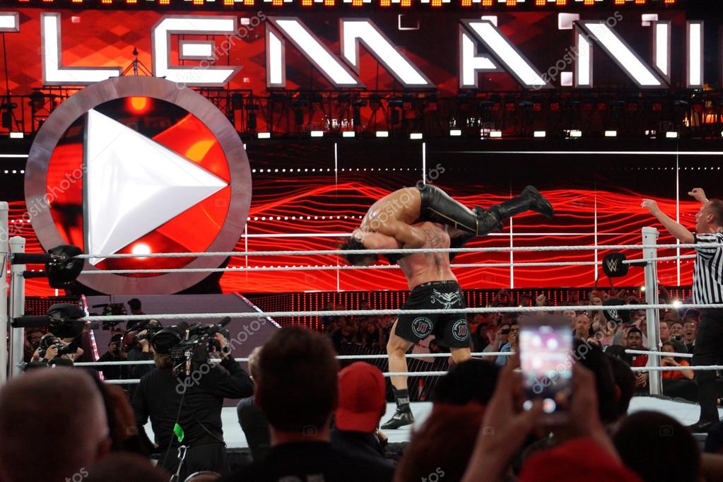 SANTA CLARA - MARCH 29: WWE Champion Brock Lesner sets up to F-5 Seth Rollins by placing him on top of his shoulders at Wrestlemania 31 at the Levi's Stadium in Santa Clara, California on March 29, 2015.