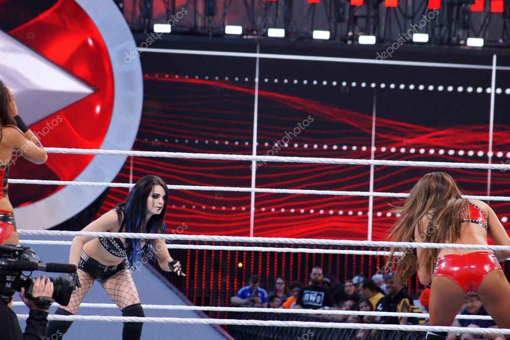 SANTA CLARA - MARCH 29: WWE Diva Paige and Nikki Bella set to lock-up in ring during tag match at Wrestlemania 31 at the Levi's Stadium in Santa Clara, California on March 29, 2015.
