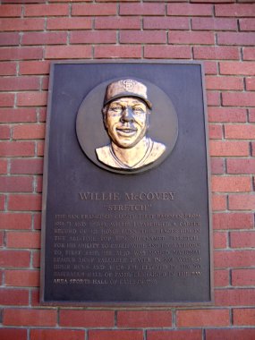 Plaque of baseball legend Willie McCovey on wall