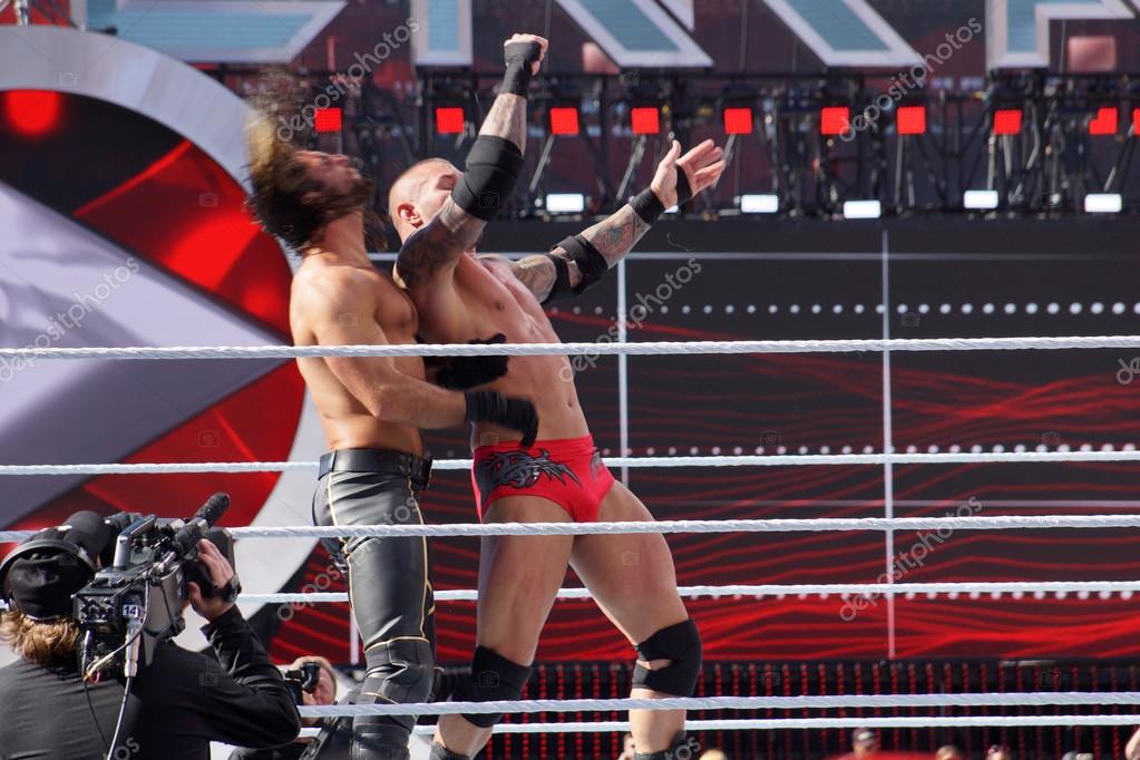 SANTA CLARA - MARCH 29: WWE Wrestler Seth Rollins gets uppercut off the ropes from Randy Orton in the ring at Wrestlemania 31 at the Levi's Stadium in Santa Clara, California on March 29, 2015.