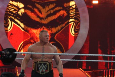 WWE Champion Brock Lesner with Championship belt on waist in rin