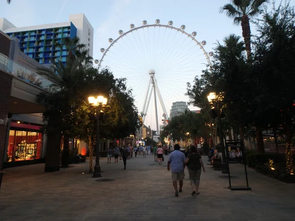 People explore the Linq the shopping and dining area leading up — стокове фото