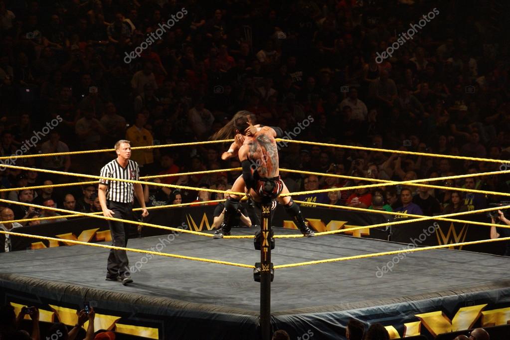 SAN JOSE - MARCH 27: NXT male wrestler Finn Balor fights with Adrian Neville on ring ropes during match at the San Jose Event Center in San Jose, California on March 27, 2015.