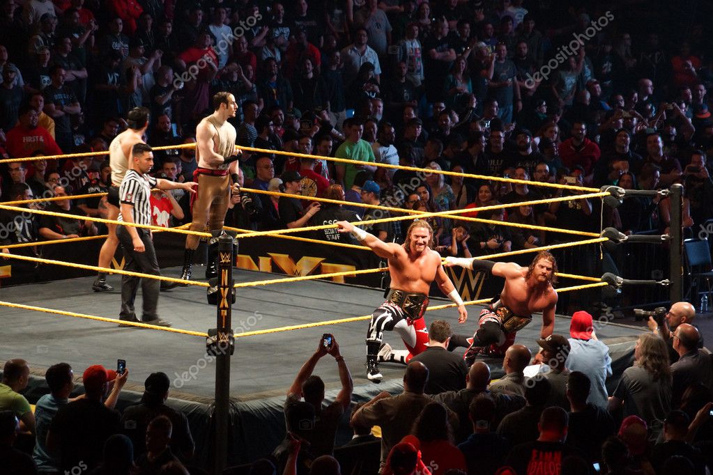 SAN JOSE - MARCH 27: NXT Tag Team Champions Blake and Murphy pose for photos as they enter ring at the San Jose Event Center in San Jose, California on March 27, 2015.