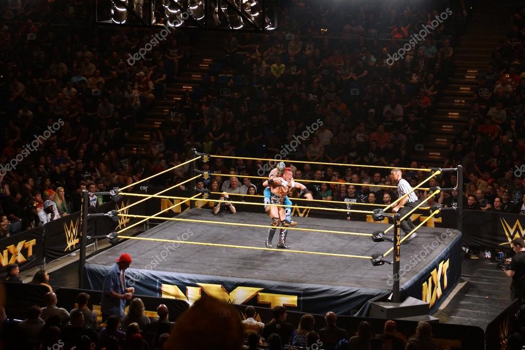 SAN JOSE - MARCH 27: WWE NXT Superstar Kalisto puts sleeper hold on wrestler Solomon Crowe during match at the San Jose Event Center in San Jose, California on March 27, 2015.