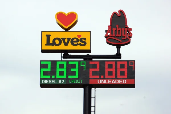 Loves Gas Station travel center and Arby's signs featuring the p — Stok fotoğraf