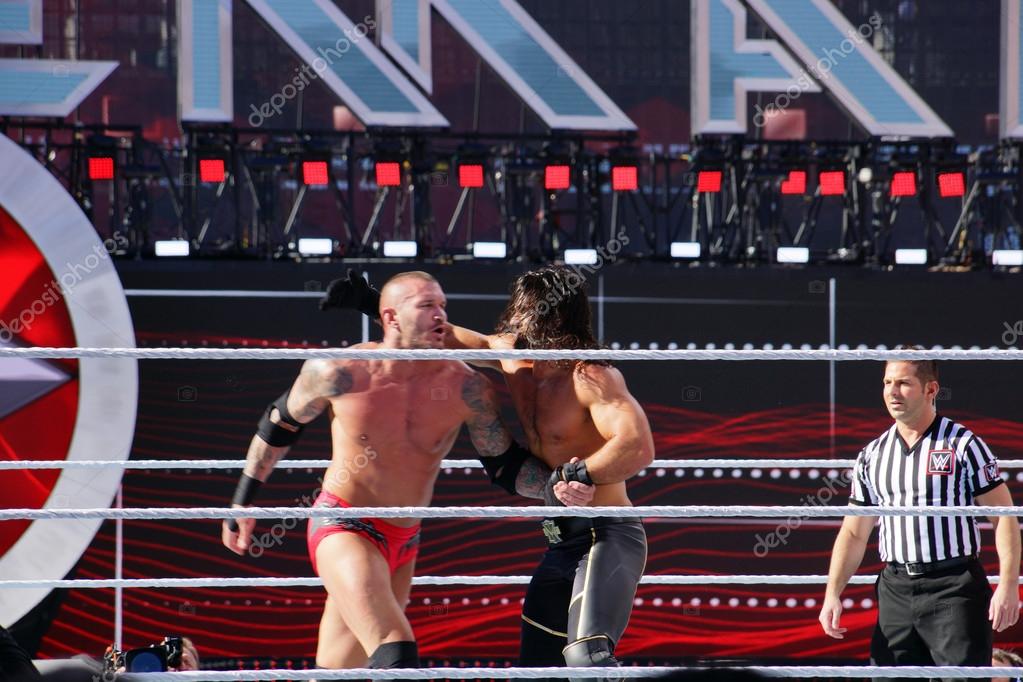 SANTA CLARA - MARCH 29: WWE Wrestler Seth Rollins throws Randy Orton into the ropes during match at Wrestlemania 31 at the Levi's Stadium in Santa Clara, California on March 29, 2015.