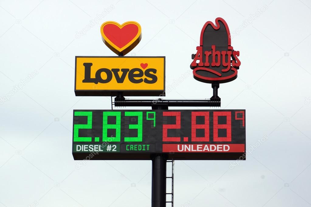 UTAH - JUNE 30: Loves Gas Station travel center and Arby's signs featuring the price of gas. Love's Travel Stops & Country Stores is a family-owned chain of more than 350 travel stops and convenience stores located in 40 states.  June 30, 2015 Utah.