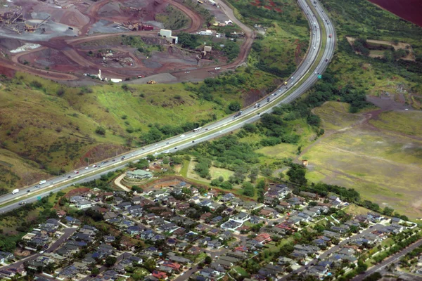 Aerial H-1 Interstate Highway running through Countryside into c — Stock Photo, Image